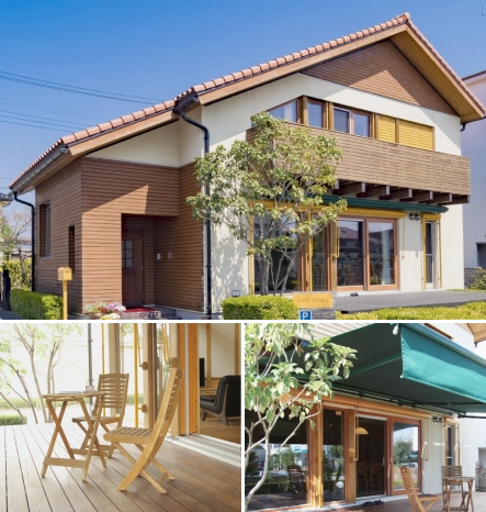 木と白い外壁を基調としたモダンなデザインのモデルハウス。大きな窓とウッドデッキが特徴で、緑豊かな庭が広がっている。周囲には屋外のテラスやカフェ風の空間も見える。